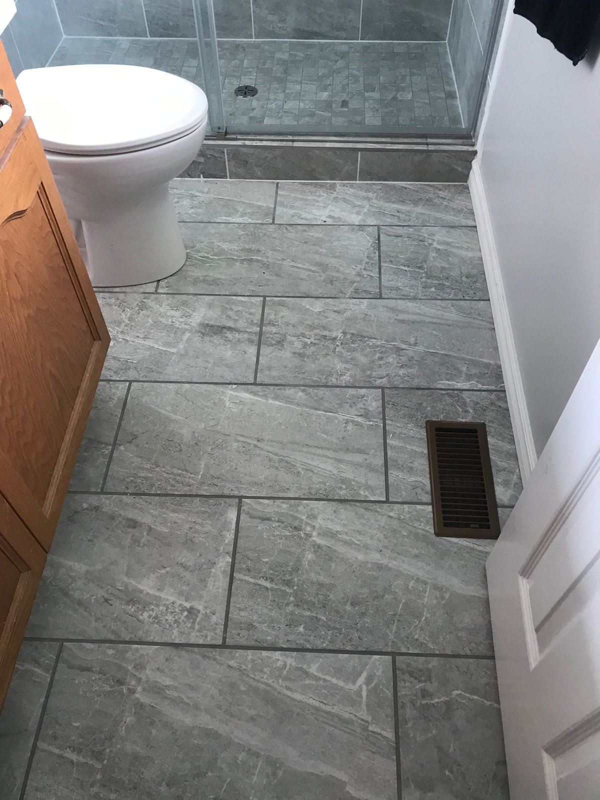 Repaired bathroom floor tilework